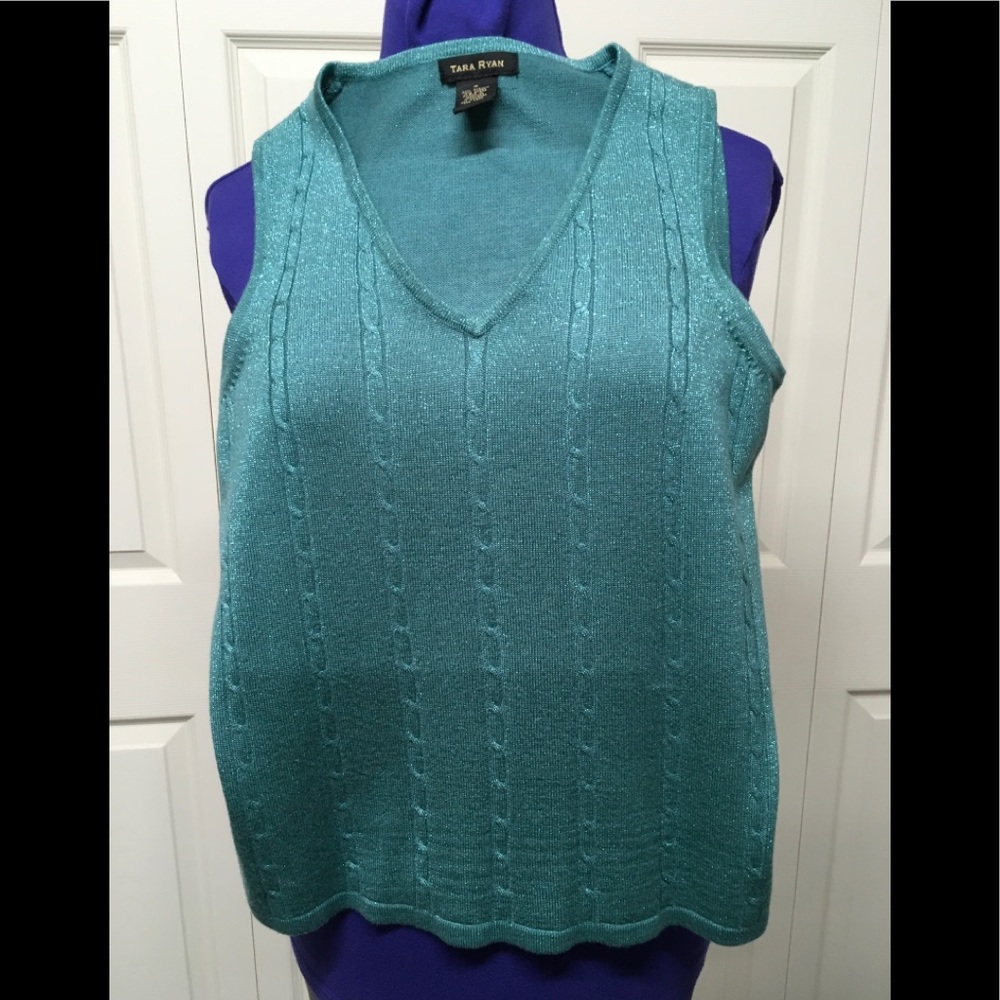 Teal knit vest.